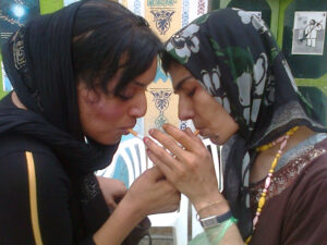 Two-Women-Sharing-a-Lighter